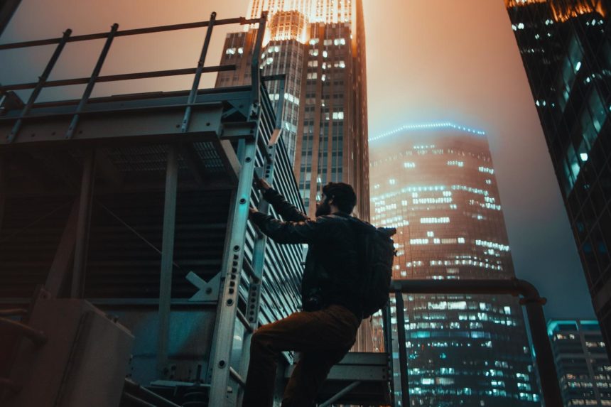 A man climbing ladders in the city, symbolizing the journey of reaching a distant goal through determination and perseverance.