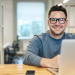 What Successful People Do Every Monday? A man sitting at a desk with a laptop